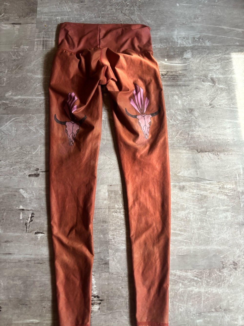 teeki Rust Orange Leggings with Pink Skull Graphics